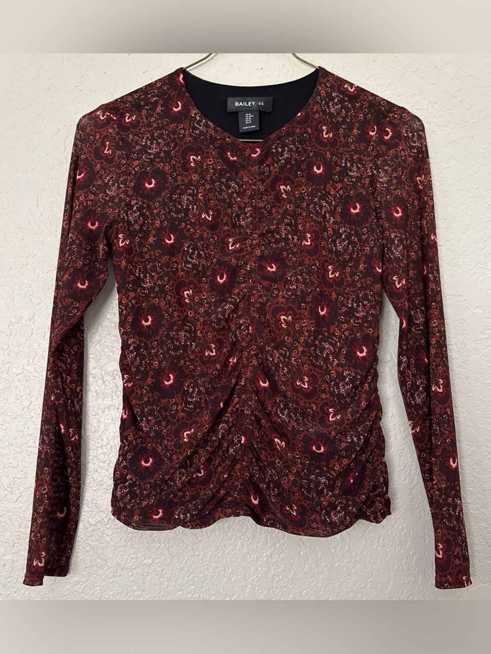 Bailey 44 Floral orange top with mesh sleeves